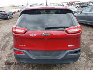 2014 Jeep Cherokee Latitude with VIN 1C4PJMCS0EW261021, listed as a IAAI auction lot 41986701 with 114,633 mi miles. Bid and sale history available at carsss.com. Image 13.