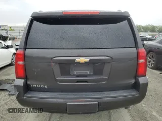 2015 Chevrolet Tahoe LT z VIN 1GNSCBKC9FR118286, wystawiony jako Copart lot #56168375 z przebiegiem 144 824 mil mil oraz Szkoda całkowita • Salvage title. Historia ofert i sprzedaży dostępna na DreamBid. Obrazek 6.