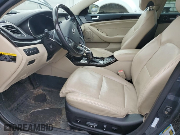 2014 Kia Cadenza Premium with VIN KNALN4D75E5123328, listed as a Copart auction lot 77590774 with 70,414 mi miles and Salvage Title. Bid and sale history available at carsss.com. Image 7.