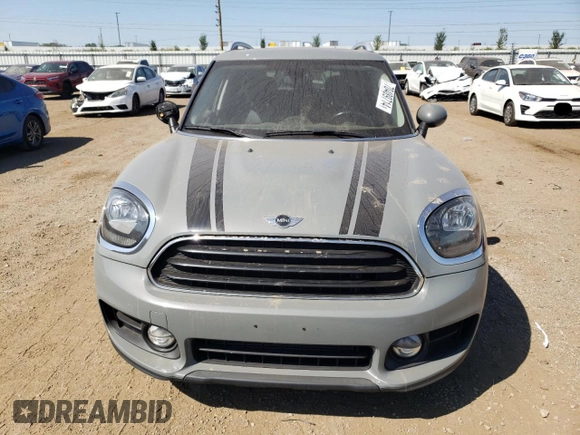 2017 MINI Countryman Cooper with VIN WMZYV5C38H3E01204, listed as a Copart auction lot 70489714 with 86,597 mi miles and Salvage Title. Bid and sale history available at carsss.com. Image 5.