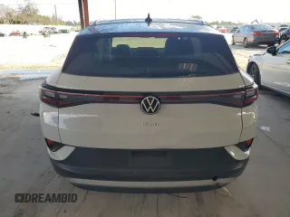 2021 Volkswagen ID.4 Pro S z VIN WVGKMPE23MP057771, wystawiony jako Copart lot #55903545 z przebiegiem 63 522 mil mil oraz Nie do naprawy • Non repairable. Historia ofert i sprzedaży dostępna na DreamBid. Obrazek 6.