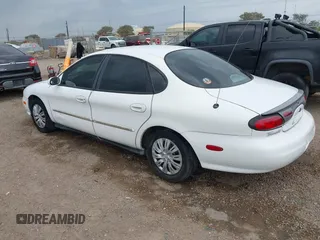 1998 Ford Taurus LX z VIN 1FAFP52U7WA146892, wystawiony jako IAAI lot #42313955 z przebiegiem 133 743 mil mil oraz . Historia ofert i sprzedaży dostępna na DreamBid. Obrazek 3.