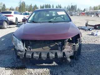 2011 Ford Fusion SEL with VIN 3FAHP0JA7BR220265, listed as a IAAI auction lot 42019909 with 170,287 mi miles. Bid and sale history available at carsss.com. Image 13.