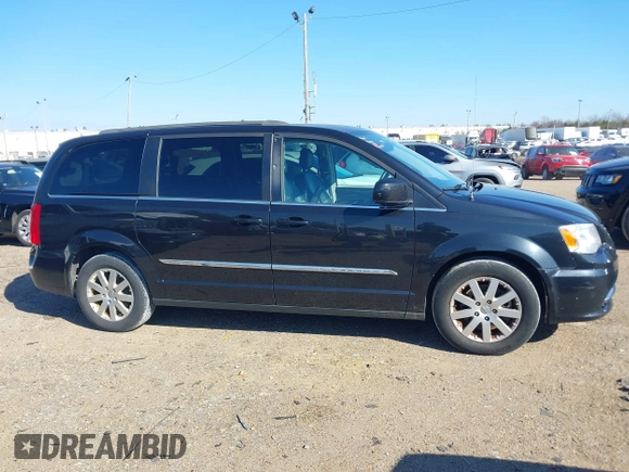 2015 Chrysler Town & Country Touring with VIN 2C4RC1BG9FR626501, listed as a IAAI auction lot 41279210 with 211,206 mi miles and . Bid and sale history available at DreamBid. Image 13.