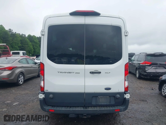 2018 Ford Transit Passenger XL z VIN 1FBAX2CM2JKA31397, wystawiony jako IAAI lot #42252424 z przebiegiem 72 434 mil mil oraz . Historia ofert i sprzedaży dostępna na DreamBid. Obrazek 16.