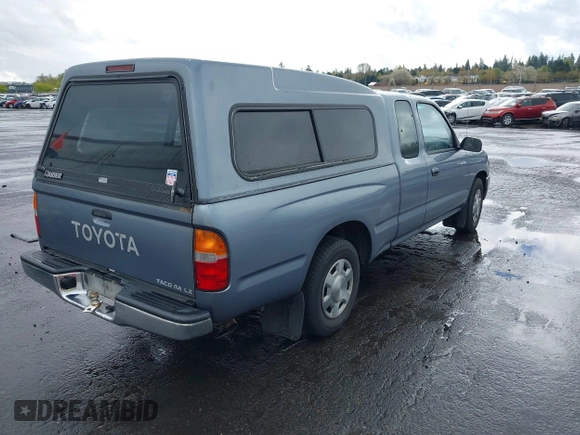 1997 Toyota Tacoma with VIN 4TAVL52N9VZ311363, listed as a IAAI auction lot 41939174 with 129,116 mi miles. Bid and sale history available at carsss.com. Image 4.