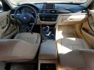 2013 BMW 3 Series 320i xDrive with VIN WBA3C3C5XDF980169, listed as a Copart auction lot 52717675 with 119,297 mi miles and Salvage title. Bid and sale history available at DreamBid. Image 8.