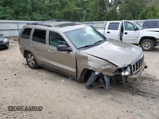 2006 Jeep Grand Cherokee Limited with VIN 1J4HS58N66C211974, listed as a Copart auction lot 60281945 with 220,229 mi miles and Salvage title. Bid and sale history available at DreamBid. Image 4.