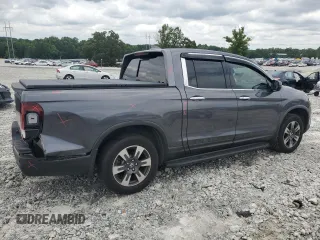 2019 Honda Ridgeline RTL-E with VIN 5FPYK3F77KB005131, listed as a Copart auction lot 60726155 with 81,797 mi miles and Salvage title. Bid and sale history available at DreamBid. Image 3.