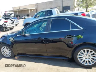 2013 Cadillac CTS Luxury with VIN 1G6DE5E51D0165634, listed as a IAAI auction lot 42208023 with 92,827 mi miles and . Bid and sale history available at DreamBid. Image 14.