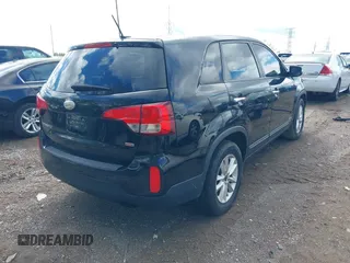 2014 Kia Sorento LX with VIN 5XYKTCA6XEG466573, listed as a IAAI auction lot 42092207 with 157,925 mi miles and . Bid and sale history available at carsss.com. Image 4.