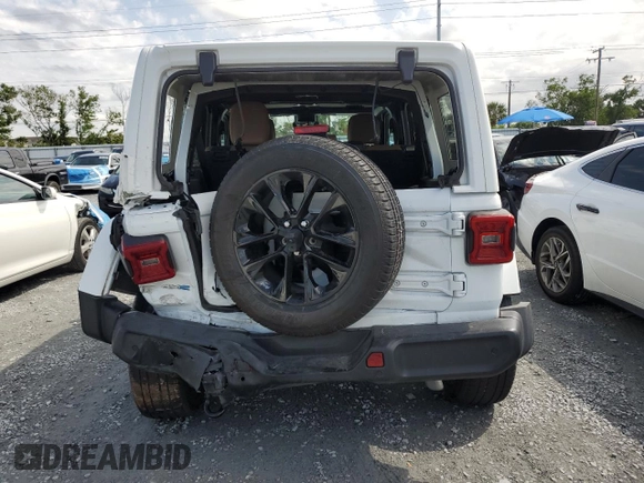2021 Jeep Wrangler Unlimited Sahara z VIN 1C4JJXP65MW766023, wystawiony jako Copart lot #52332735 z przebiegiem 23 130 mil mil oraz Nie do naprawy • Non repairable. Historia ofert i sprzedaży dostępna na DreamBid. Obrazek 6.