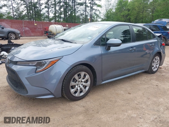 2021 Toyota Corolla LE with VIN JTDEPMAE8MJ162896, listed as a IAAI auction lot 41942669 with 99,131 mi miles. Bid and sale history available at carsss.com. Image 2.