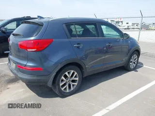2014 Kia Sportage LX with VIN KNDPBCAC2E7648831, listed as a IAAI auction lot 41963773 with 118,399 mi miles and . Bid and sale history available at carsss.com. Image 4.