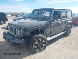 2018 Jeep Wrangler Unlimited Sahara z VIN 1C4HJXEN9JW215890, wystawiony jako IAAI lot #41215063 z przebiegiem 39 567 mil mil oraz . Historia ofert i sprzedaży dostępna na DreamBid. Obrazek 17.