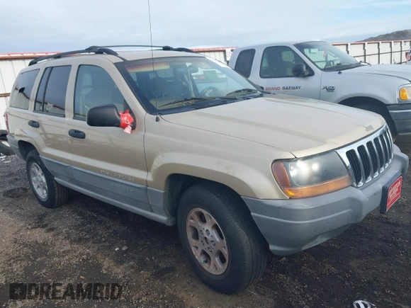 2000 Jeep Grand Cherokee Laredo with VIN 1J4GW48S4YC256978, listed as a IAAI auction lot 40652709 with 117,859 mi miles and . Bid and sale history available at DreamBid. Image 1.