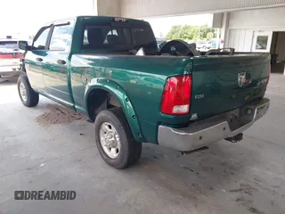 2014 Ram 2500 Big Horn with VIN 3C6UR5DLXEG150779, listed as a IAAI auction lot 42254622 with 199,510 mi miles and . Bid and sale history available at DreamBid. Image 3.