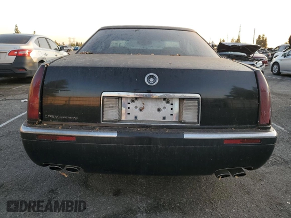 1999 Cadillac Eldorado ESC with VIN 1G6EL12Y8XU614645, listed as a Copart auction lot 86353754 with 151,243 mi miles and Clean Title. Bid and sale history available at DreamBid. Image 6.