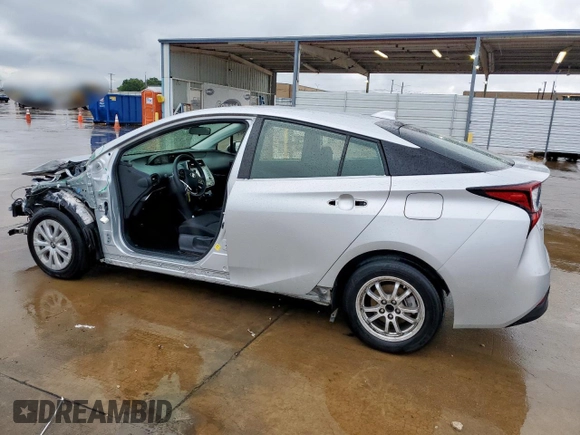 2021 Toyota Prius L Eco with VIN JTDKAMFU1M3142014, listed as a Copart auction lot 55038365 with 76,211 mi miles and Salvage title. Bid and sale history available at DreamBid. Image 2.