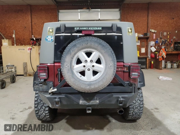 2007 Jeep Wrangler Sahara z VIN 1J4FA54127L132543, wystawiony jako Copart lot #55891995 z przebiegiem 74 616 mil mil oraz Szkoda całkowita • Salvage title. Historia ofert i sprzedaży dostępna na DreamBid. Obrazek 6.