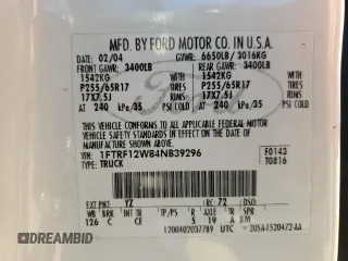2004 Ford F-150 XL z VIN 1FTRF12W84NB39296, wystawiony jako Copart lot #54334695 z przebiegiem 299 033 mil mil oraz Szkody całkowita. Historia ofert i sprzedaży dostępna na DreamBid. Obrazek 12.