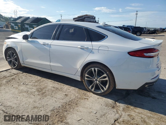 2020 Ford Fusion Titanium with VIN 3FA6P0D98LR176335, listed as a Copart auction lot 55323275 with 76,572 mi miles and Salvage title. Bid and sale history available at DreamBid. Image 2.