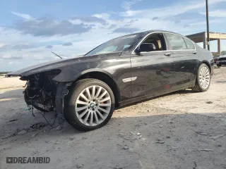 2012 BMW 7 Series 750i xDrive with VIN WBAKC6C58CC396835, listed as a Copart auction lot 86833724 with 0 mi miles and Salvage Title. Bid and sale history available at carsss.com. Image 1.