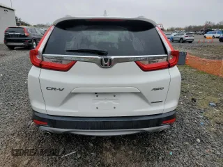2019 Honda CR-V Touring with VIN 2HKRW2H91KH633732, listed as a Copart auction lot 52750975 with 58,642 mi miles and Salvage Title. Bid and sale history available at carsss.com. Image 6.