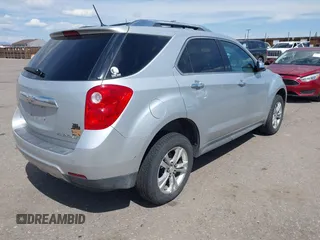 2013 Chevrolet Equinox LTZ z VIN 2GNFLGEKXD6309001, wystawiony jako IAAI lot #42058332 z przebiegiem 144 250 mil mil oraz . Historia ofert i sprzedaży dostępna na DreamBid. Obrazek 4.