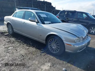 2006 Jaguar XJ with VIN SAJWA71B96SH04571, listed as a IAAI auction lot 41574323 with 1 mi miles. Bid and sale history available at carsss.com. Image 1.