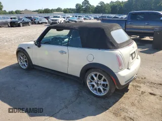 2006 MINI Convertible S с VIN WMWRH33546TF85908, выставлен на аукционе Copart как лот 61363025 с пробегом 105 053 миль миль и Списание • Salvage title. История ставок и продаж доступна на DreamBid. Изображение 2.