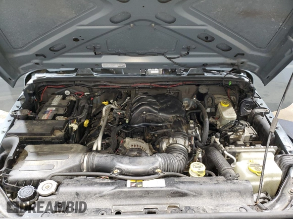 2014 Jeep Wrangler Sport with VIN 1C4AJWAG9EL322982, listed as a Copart auction lot 51145075 with 122,686 mi miles and Salvage Title. Bid and sale history available at DreamBid. Image 12.