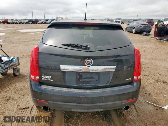 2013 Cadillac SRX Premium Collection с VIN 3GYFNJE39DS650569, выставлен на аукционе Copart как лот 59947905 с пробегом 146 548 миль миль и Списание • Salvage title. История ставок и продаж доступна на DreamBid. Изображение 6.