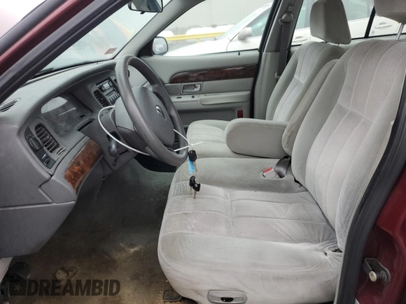 2005 Mercury Grand Marquis GS with VIN 2MEFM74W05X604628, listed as a Copart auction lot 51332335 with 165,224 mi miles and Salvage Title. Bid and sale history available at DreamBid. Image 7.