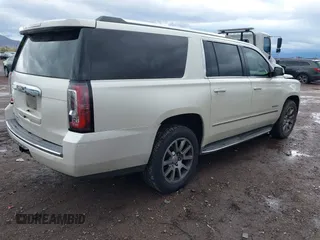 2015 GMC Yukon XL Denali with VIN 1GKS2JKJ2FR590502, listed as a IAAI auction lot 41758575 with 129,777 mi miles. Bid and sale history available at carsss.com. Image 4.