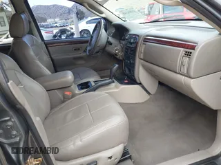 2004 Jeep Grand Cherokee Limited with VIN 1J8GX58N34C360819, listed as a IAAI auction lot 41816348 with 144,609 mi miles and . Bid and sale history available at DreamBid. Image 5.