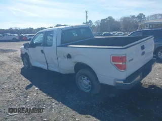 2014 Ford F-150 XL with VIN 1FTFX1CF5EKG23962, listed as a IAAI auction lot 41453430 with 184,837 mi miles. Bid and sale history available at carsss.com. Image 3.