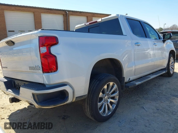 2021 Chevrolet Silverado 1500 High Country with VIN 3GCUYHET2MG281182, listed as a IAAI auction lot 41629483 with 114,663 mi miles. Bid and sale history available at carsss.com. Image 4.