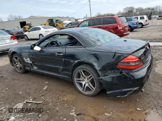 2009 Mercedes-Benz SL 55/63 AMG with VIN WDBSK70F79F157839, listed as a Copart auction lot 52350295 with 79,670 mi miles and Salvage title. Bid and sale history available at DreamBid. Image 2.