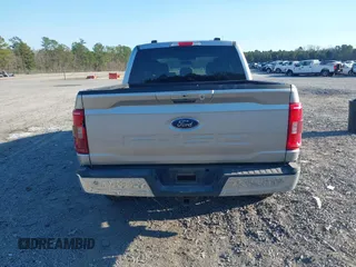 2021 Ford F-150 XL with VIN 1FTFW1E58MFA73753, listed as a IAAI auction lot 41707310 with 138,450 mi miles. Bid and sale history available at carsss.com. Image 16.