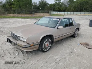 1991 Cadillac Eldorado z VIN 1G6EL13B4MU604636, wystawiony jako Copart lot #79155234 z przebiegiem Nie podano mil oraz Nie do naprawy. Historia ofert i sprzedaży dostępna na DreamBid. Obrazek 1.