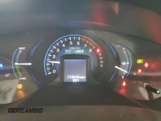 2013 Honda Insight EX with VIN JHMZE2H71DS006758, listed as a Copart auction lot 55296825 with 174,046 mi miles and Salvage title. Bid and sale history available at DreamBid. Image 9.