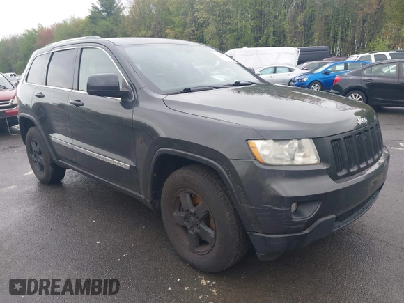 2011 Jeep Grand Cherokee Laredo with VIN 1J4RR4GGXBC604304, listed as a IAAI auction lot 42201742 with 196,483 mi miles and . Bid and sale history available at DreamBid. Image 1.