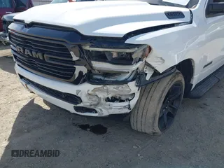2021 Ram 1500 Big Horn with VIN 1C6SRFFT0MN521027, listed as a IAAI auction lot 41830596 with 55,013 mi miles and . Bid and sale history available at DreamBid. Image 12.