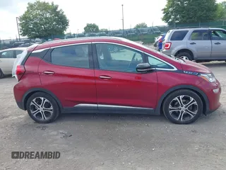 2020 Chevrolet Bolt EV Premier with VIN 1G1FZ6S03L4128822, listed as a IAAI auction lot 42708559 with 38,411 mi miles and . Bid and sale history available at DreamBid. Image 13.