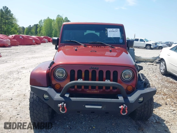 2007 Jeep Wrangler Unlimited Sahara with VIN 1J4GA59187L116585, listed as a IAAI auction lot 41996297 with 151,961 mi miles and . Bid and sale history available at DreamBid. Image 12.