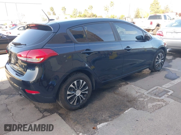 2017 Kia Forte5 LX with VIN KNAFK5A80H5696912, listed as a IAAI auction lot 41963104 with 97,009 mi miles. Bid and sale history available at carsss.com. Image 4.