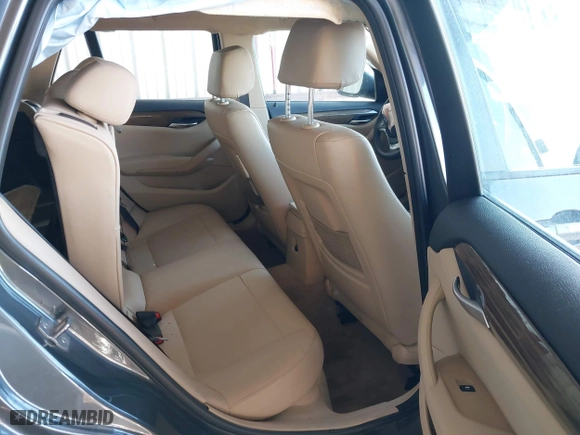 2013 BMW X1 28i with VIN WBAVM1C53DVW43228, listed as a IAAI auction lot 41301776 with 61,323 mi miles. Bid and sale history available at carsss.com. Image 8.