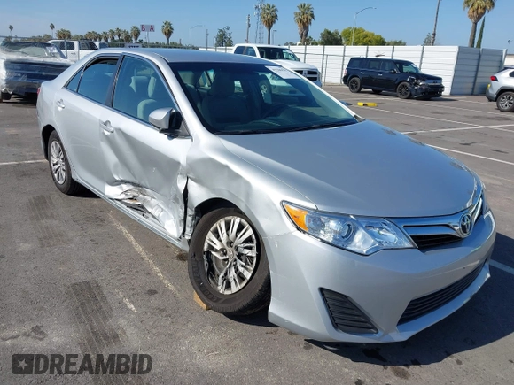 2014 Toyota Camry L with VIN 4T4BF1FK5ER442960, listed as a IAAI auction lot 42206639 with 119,639 mi miles and . Bid and sale history available at DreamBid. Image 1.