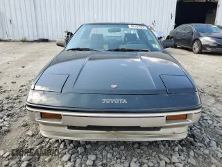1986 Toyota MR2 z VIN JT2AW15C6G0075929, wystawiony jako Copart lot #68167924 z przebiegiem 123 975 mil mil oraz Tytuł czysty. Historia ofert i sprzedaży dostępna na DreamBid. Obrazek 5.